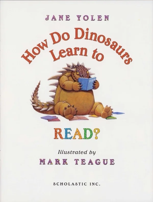 Title page of How Do Dinosaurs Learn to Read showing an ankylosaur holding a small blue book